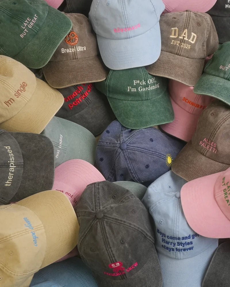 Caps besticken lassen