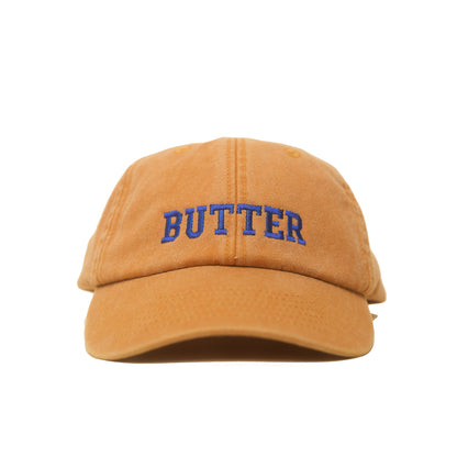 Mustard Vintage Cap mit blauem Schriftzug „Butter“ in Frontansicht